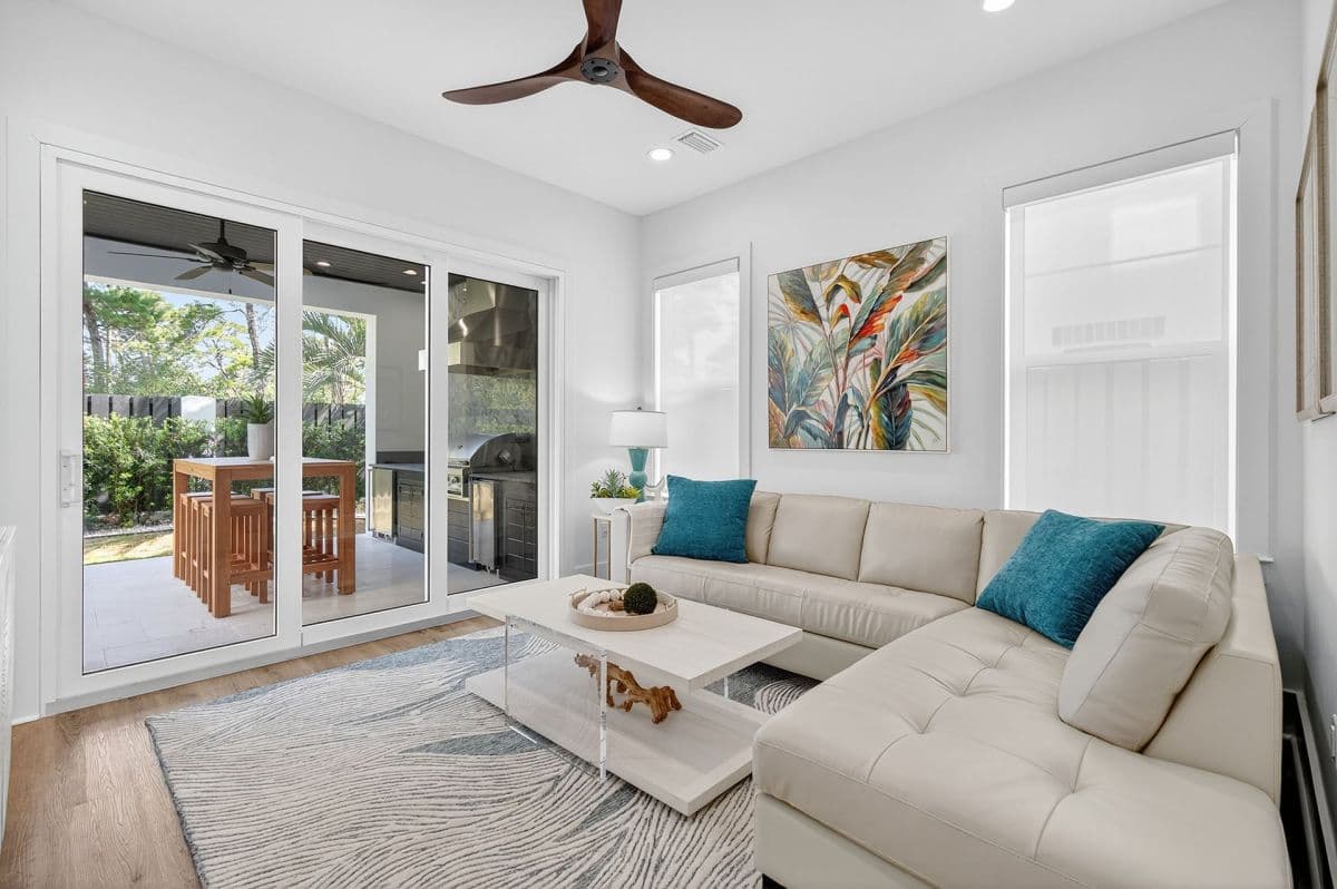 Living room opening onto pool deck
